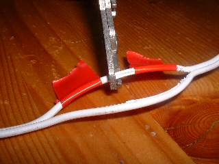 Clip of 12V DC power lead